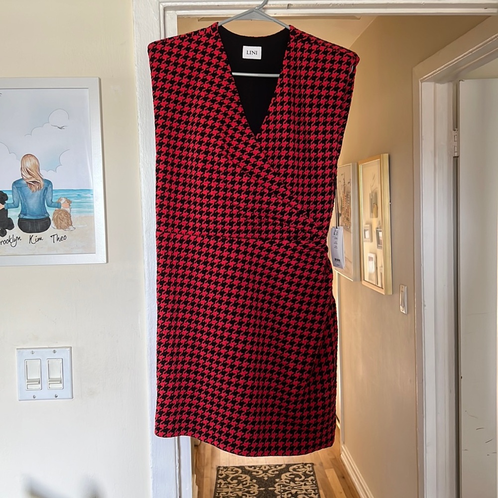 Brand new hounds tooth Lini dress size large runs a little small to me.